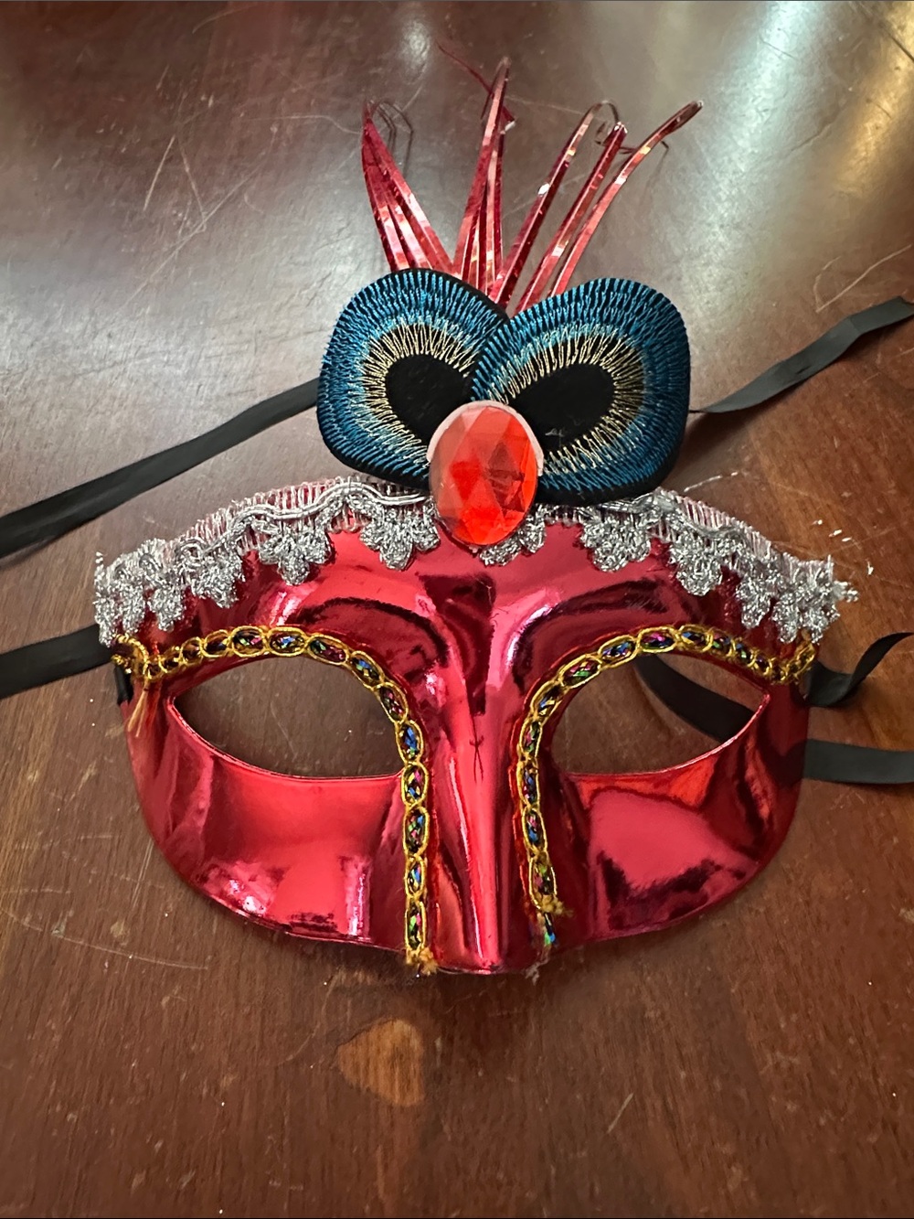 Red Metallic Venetian Masquerade Mask with Blue Feather Accent